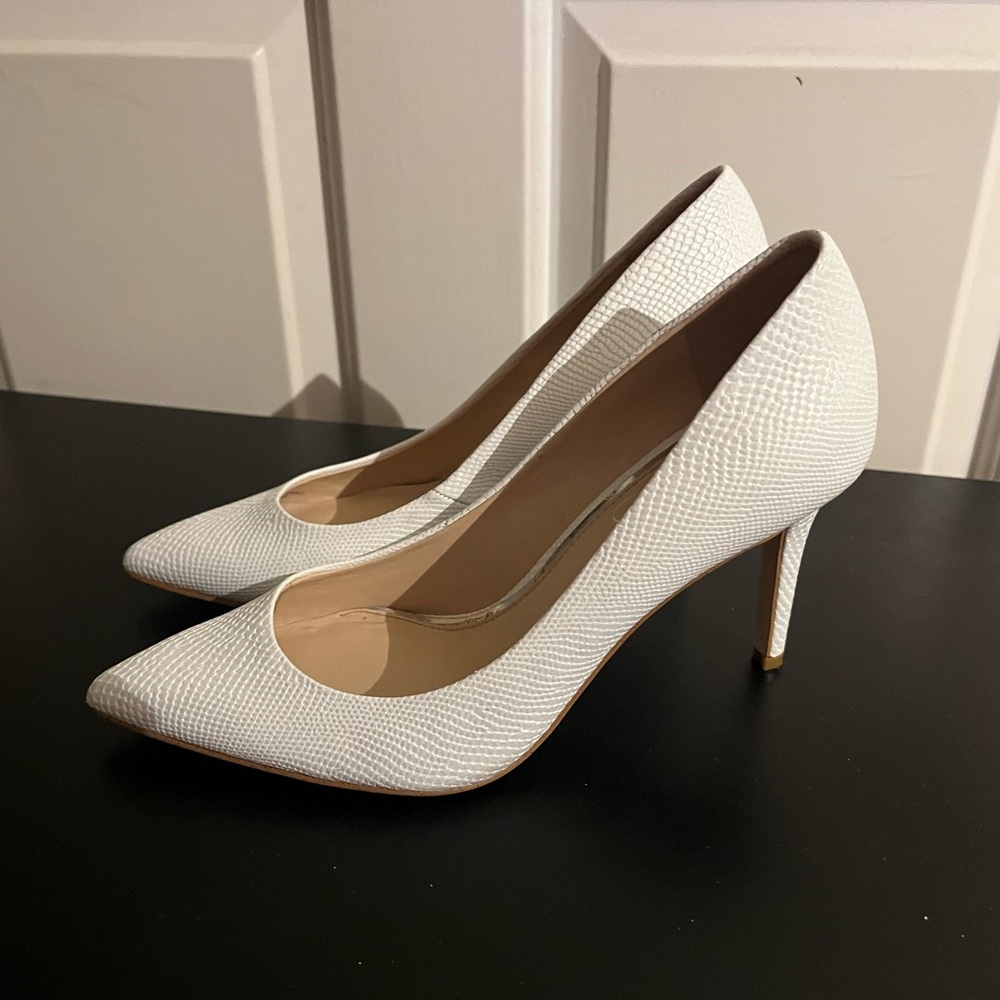 White pointed toe heels